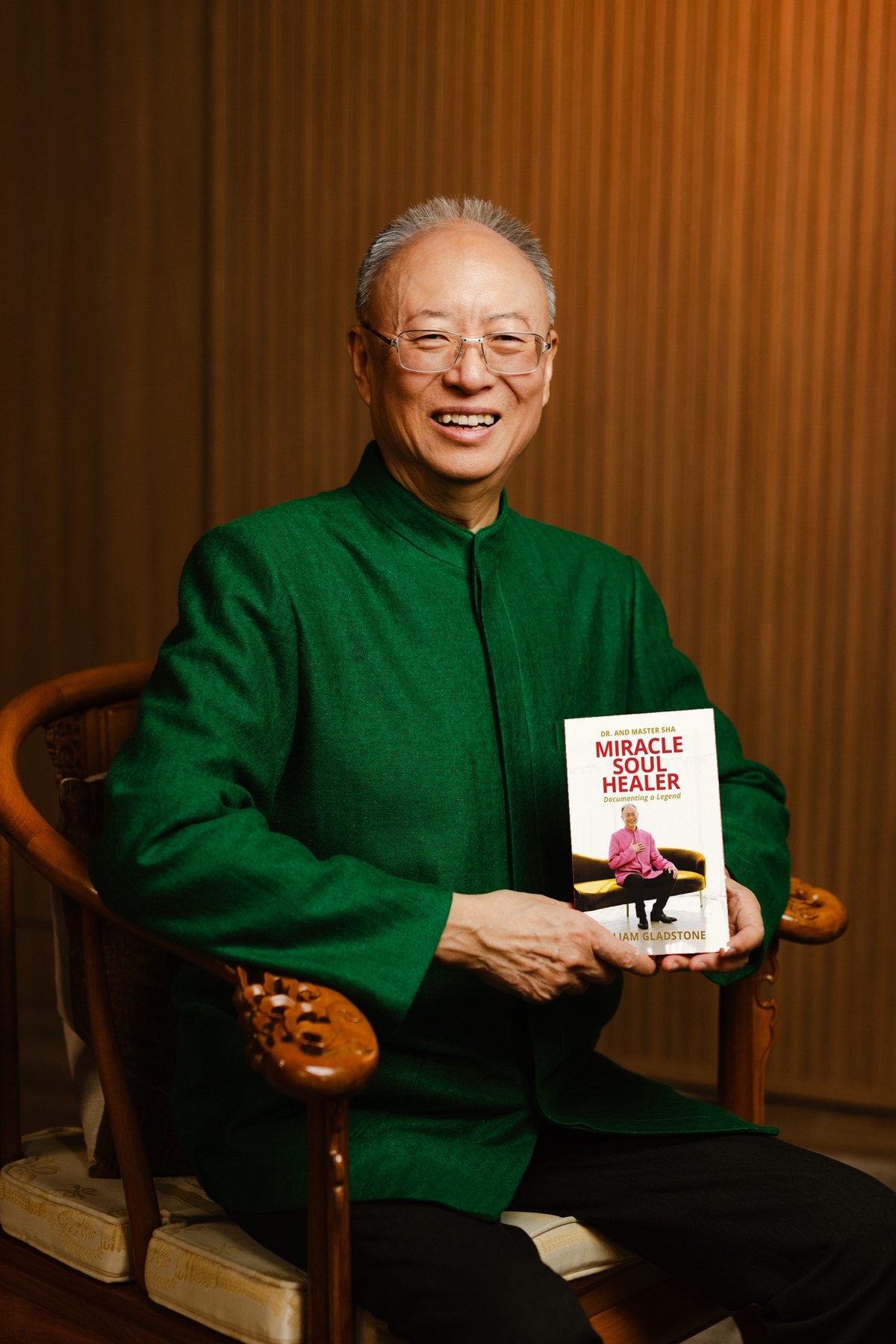 Dr. and Master Zhi Gang Sha holding his book Miracle Soul Healer